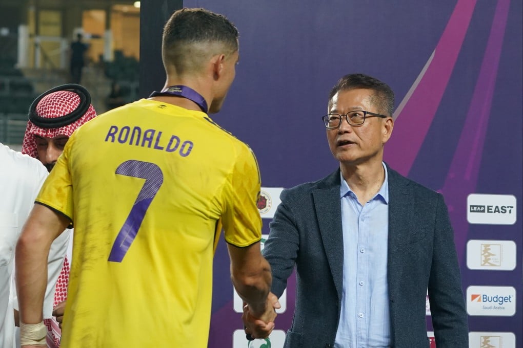 Financial Secretary Paul Chan shakes hands with Cristiano Ronaldo at Hong Kong Stadium. Photo: Handout