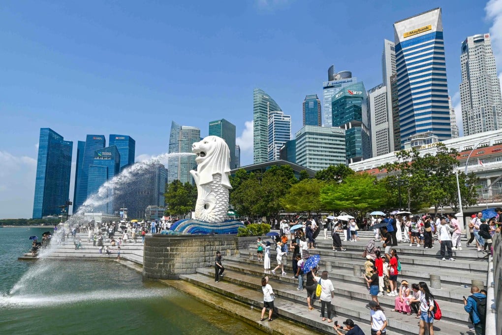 Visitors at the Marina Bay waterfront in Singapore at the end of July. Photo: AFP