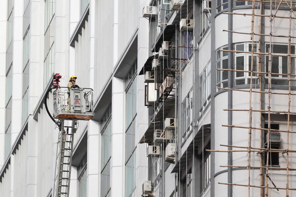 Firefighters were deployed on Saturday at the Mido Apartments in North Point when a blaze broke out. Photo: Eugene Lee