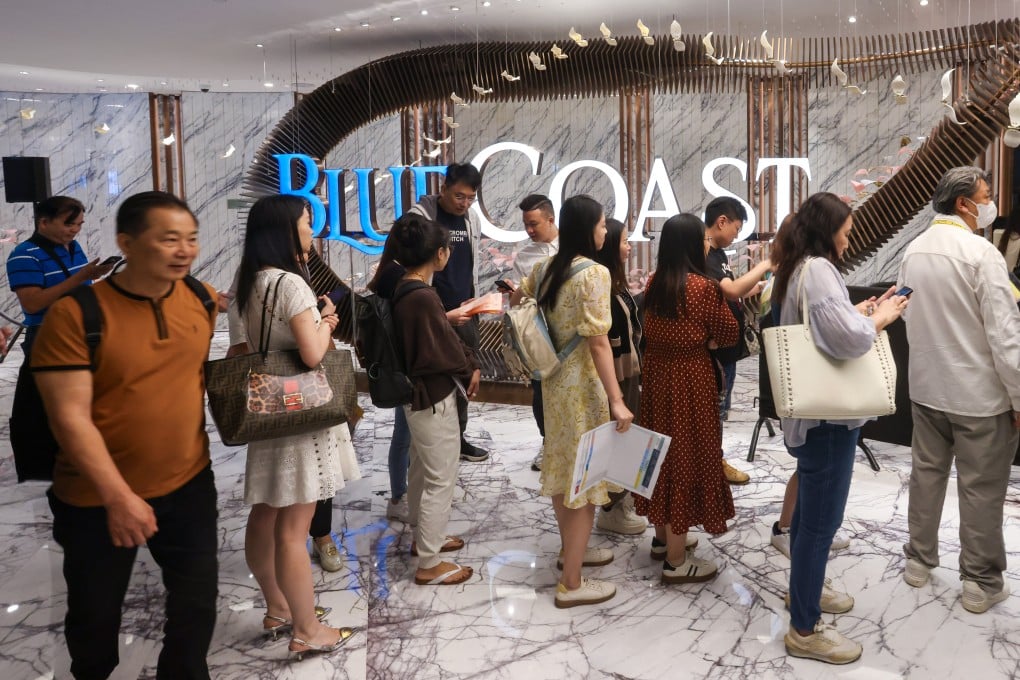 Homebuyers queue at the sales office of the Blue Coast II project developed by CK Asset in Wong Chuk Hang, at Fortune Metropolis in Hung Hom on October 19, 2024. Photo: Jonathan Wong