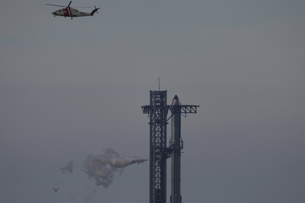 SpaceX’s megarocket Starship vents in preparation for its test flight before the launch is cancelled on Sunday. Photo: AP