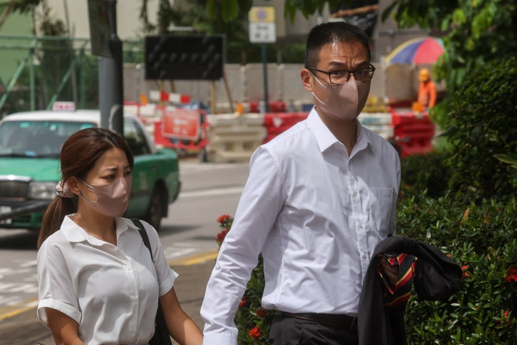 Senior police officer Chan Kin-yee, 42, and his wife appear at Fanling Court. Photo: Edmond So