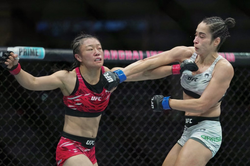 China’s Shi Ming (left) lost a gruelling three-round strawweight bout against Brazil’s Bruna Brasil at UFC Fight Night in Shanghai on Friday. Photo: AFP