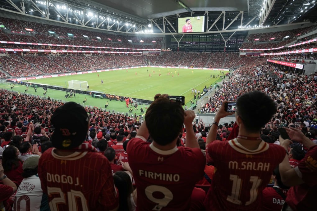 Fans watch the match between Liverpool and AC Milan during Hong Kong Football Festival at Kai Tak Stadium last month. Photo: Sam Tsang