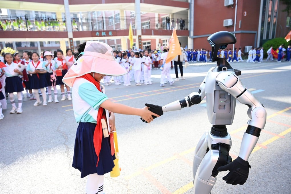 Children from Experimental Primary School shake hands with a humanoid robot in Xuzhou, China, on April 23. Photo: NurPhoto via Getty Images