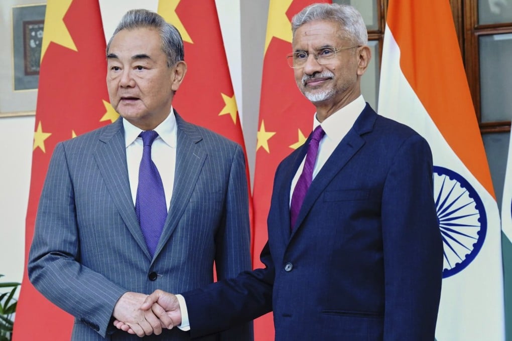 Chinese Foreign Minister Wang Yi shakes hands with Indian Foreign Minister S. Jaishankar in New Delhi, India on August 18, ahead of the Indian prime minister’s first visit to China in seven years. Photo: Indian Foreign Ministry via AP