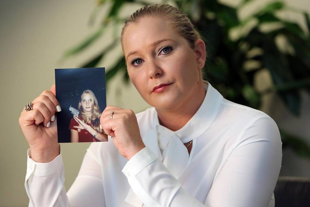 Virginia Giuffre with a photo of herself as a teenager, when she said she was abused by Jeffrey Epstein, Ghislaine Maxwell and Prince Andrew. Giuffre died by suicide in April. Photo: Miami Herald / TNS