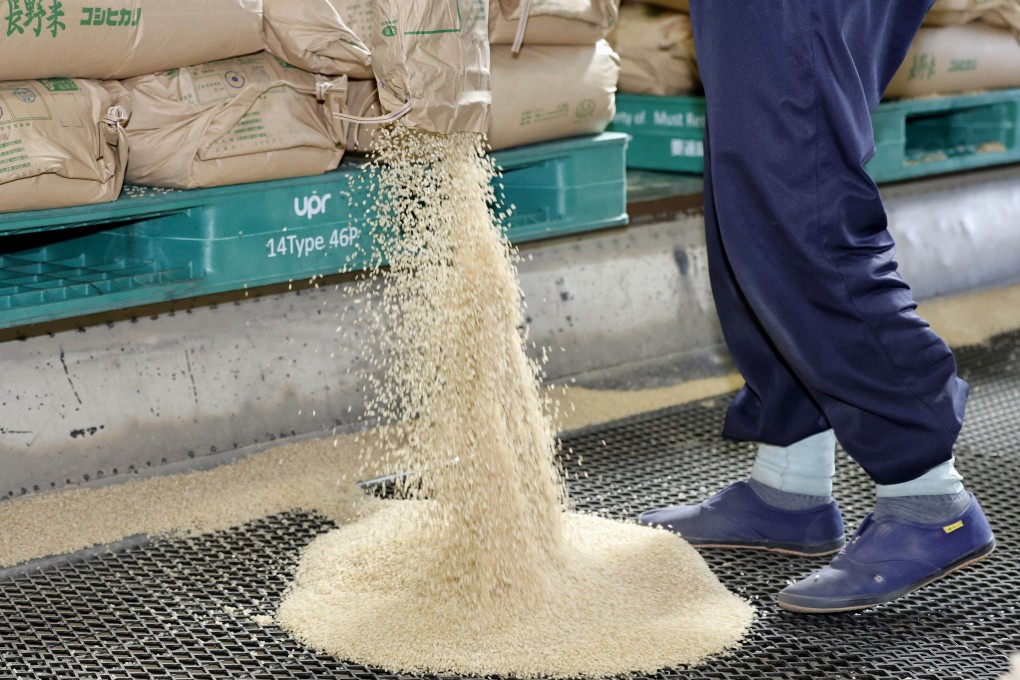 The Japanese government’s emergency rice reserves in Saitama prefecture. More than 90 per cent of low-income households in Japan are struggling to afford food for their children, a survey shows. Photo: Kyodo