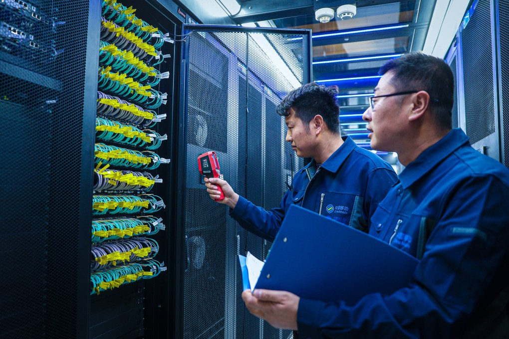 Staff members work at China Mobile’s computing centre in Qingyang, northwest Gansu province, January 6, 2025. Photo: Xinhua