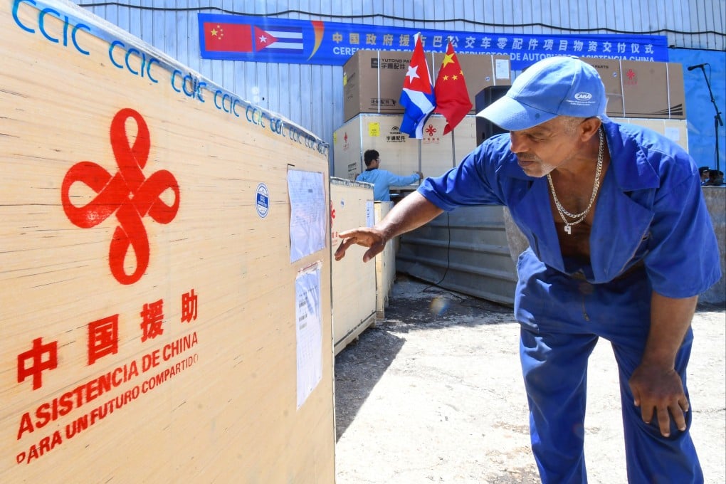 A worker in Cuba checks bus parts and accessories one of the Chinese government assistance projects to the country. Photo: Xinhua