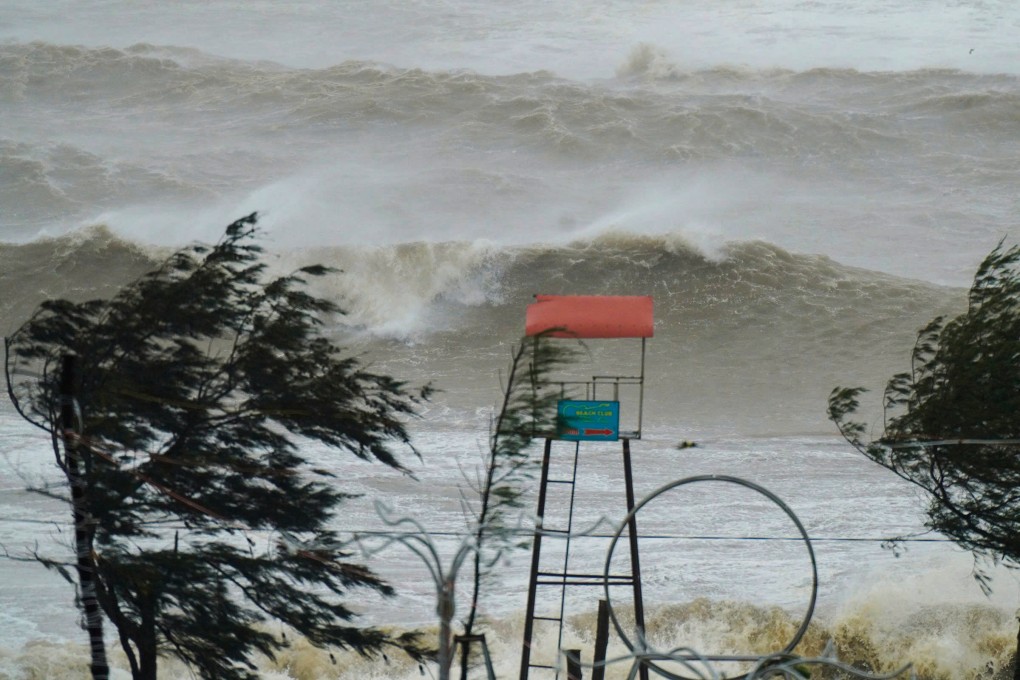 Waves surge in Ha Tinh province, Vietnam on Monday as Typhoon Kajiki makes landfall. Photo: AP