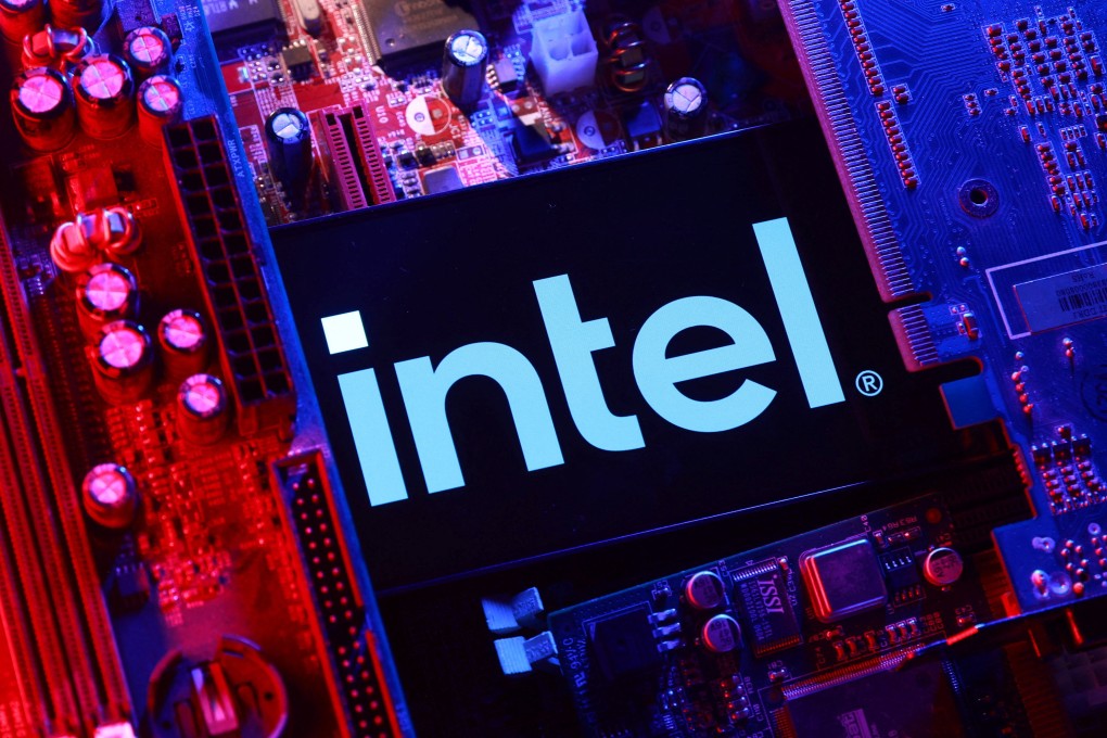 An Intel logo and a computer motherboard. Photo: Reuters