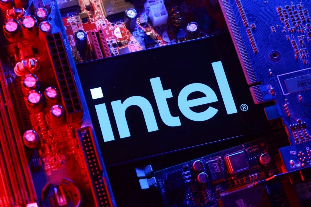 An Intel logo and a computer motherboard. Photo: Reuters