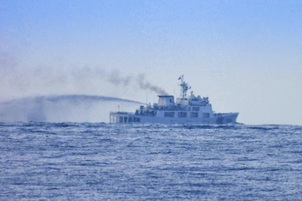 A China Coast Guard vessel conducts an apparent water cannon drill close to long-grounded Philippine warship BRP Sierra Madre in the vicinity of Second Thomas Shoal in the disputed South China Sea on August 20. Photo: Armed Forces of the Philippines PAO via AP