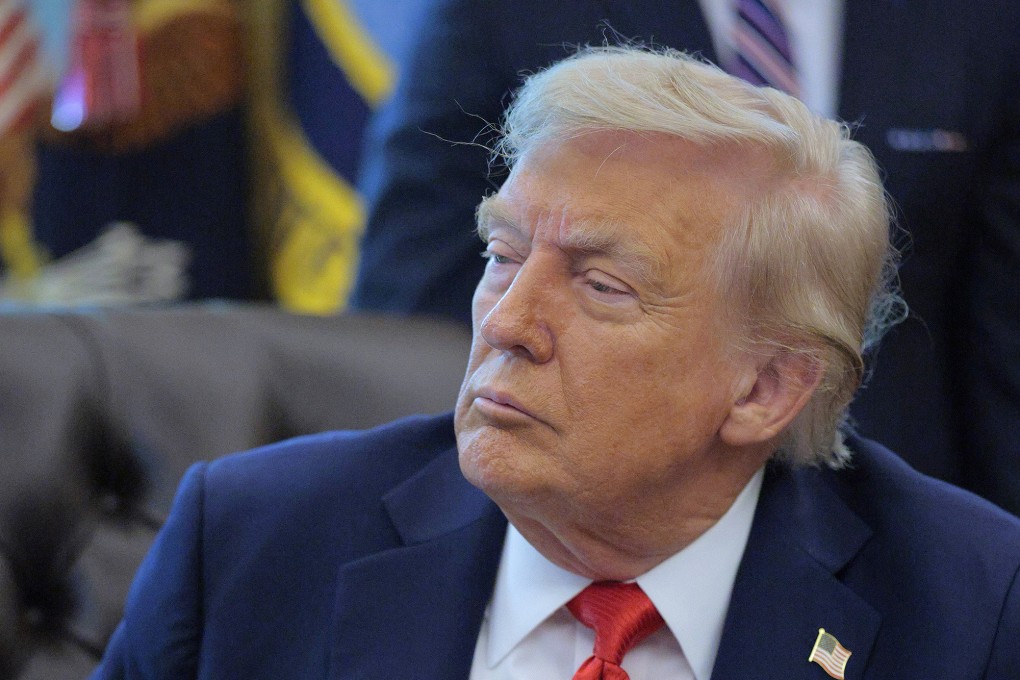 US President Donald Trump talks to journalists at the White House on Monday. Photo: TNS