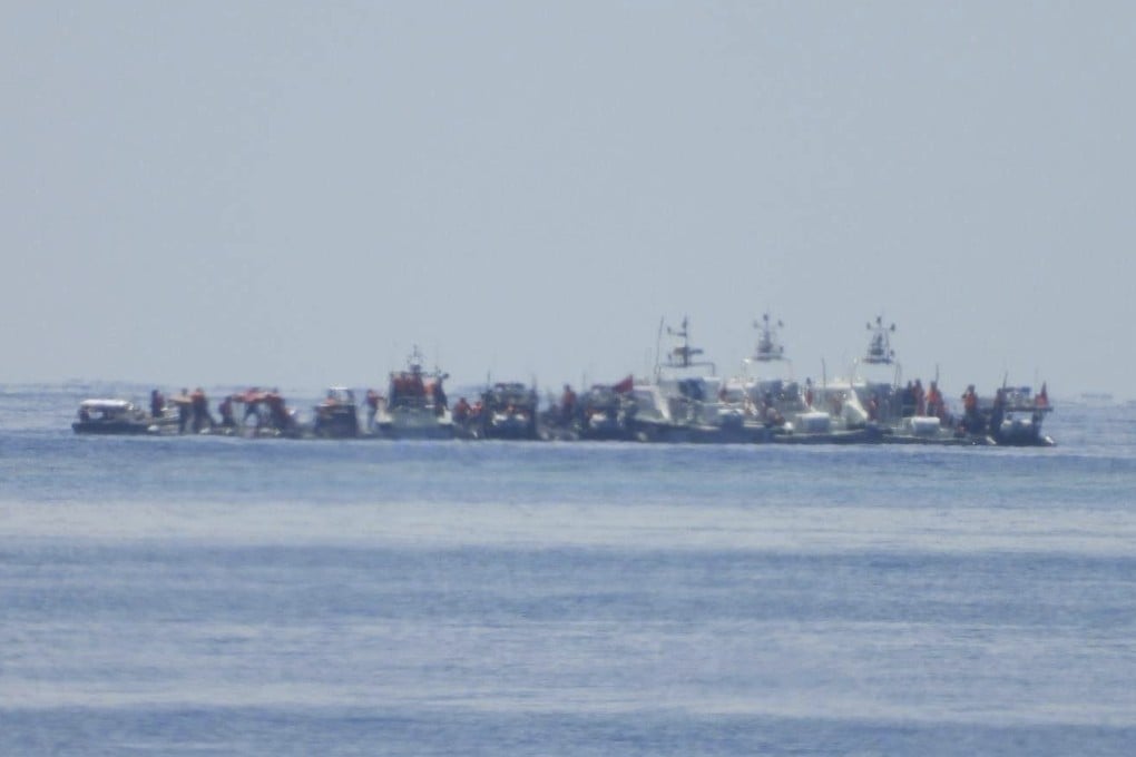 Chinese vessels, some mounted with armaments, are seen close to Philippine warship BRP Sierra Madre in the South China Sea on August 20. Photo: Armed Forces of the Philippines/AP