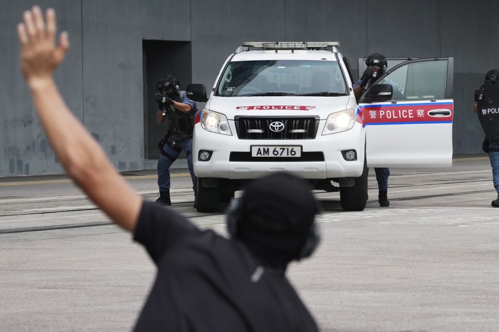 Members of the Inter-departmental Counter Terrorism Unit take part in the counterterrorism drill at Kai Tak Cruise Terminal on August 28. Photo: Karma Lo