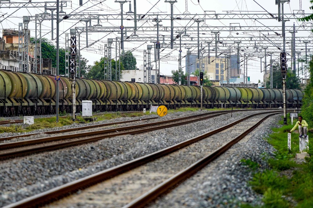 A freight train transports petrol wagons in Ajmer, India. New Delhi has defended purchases of Russian oil as necessary to keep energy prices low. Photo: AFP