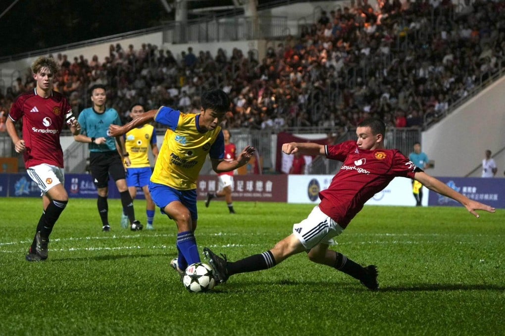 Vito Wong (middle) carries the fight to the Manchester United under-16s in a match for a Hong Kong Premier Youth League Select team. Photo: Handout