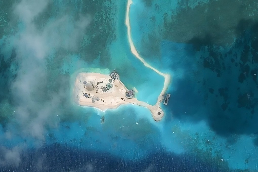 Satellite imagery taken in 2025 shows Vietnamese dredging and landfill work at a reef in the Spratly Islands that had previously housed only small concrete pillbox structures. Photo: Handout