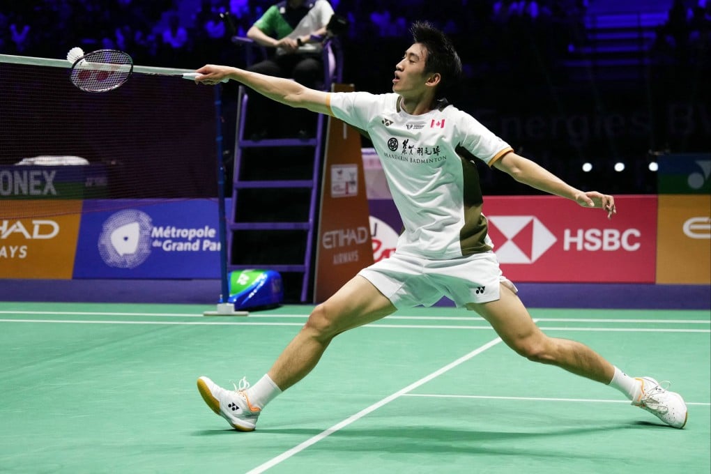 Canada’s Victor Lai lands a return during his stunning win over Singapore’s Loh Kean Yew at the Badminton World Championships. Photo: AFP