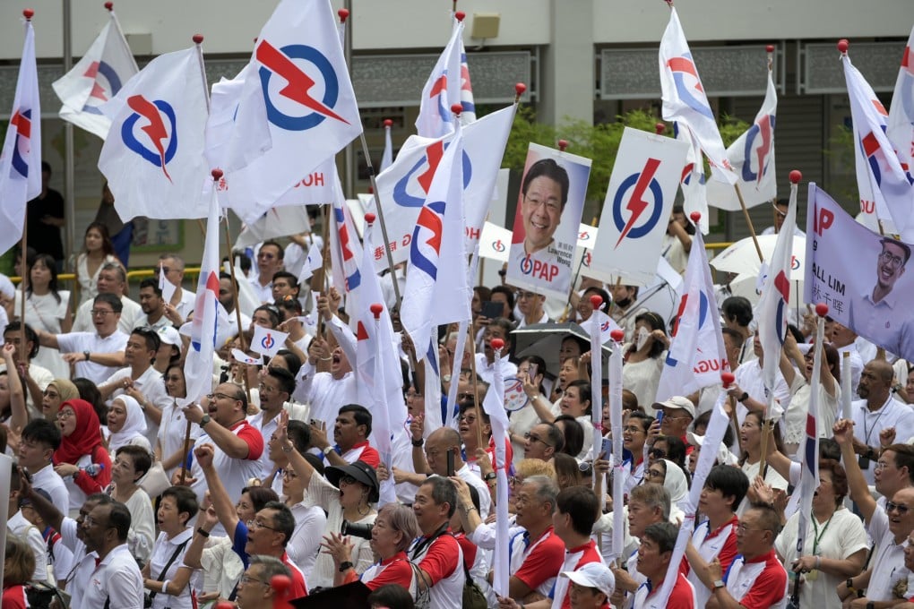 Supporters of the ruling People’s Action Party gather at a nomination centre in Singapore on April 23 ahead of the May 3 general election. The PAP has ruled Singapore for 66 years. Photo: EPA-EFE