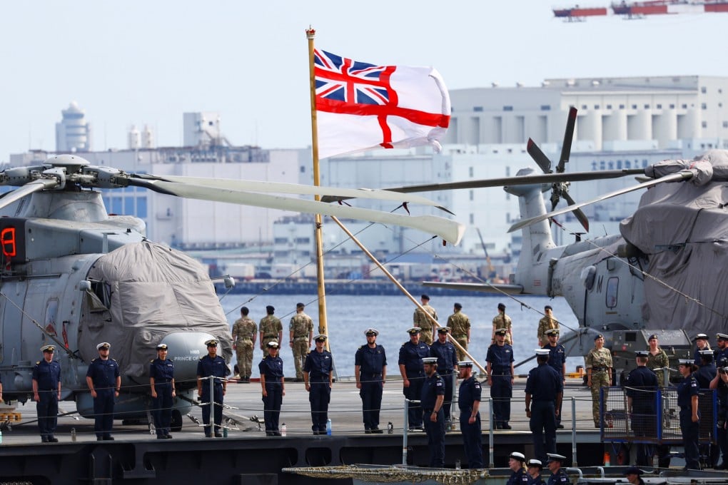 British military personnel on board the UK’s HMS Prince of Wales aircraft carrier in Tokyo on Thursday. Photo: Reuters