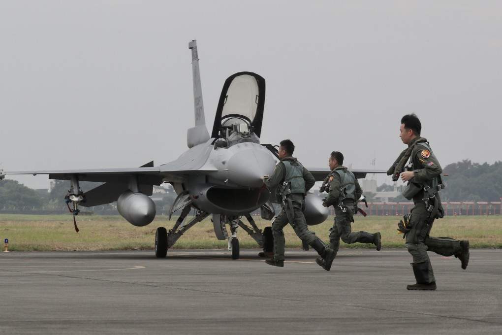 Taiwan Air Force pilots run towards a F-16V fighter jet during a military drill in 2022. Taiwan has an extensive inventory of US weapons but has lately been hit with supply delays. Photo: EPA-EFE