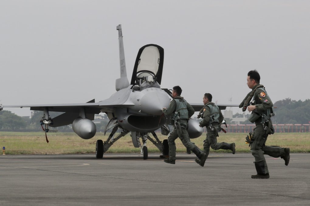 Taiwan Air Force pilots run towards a F-16V fighter jet during a military drill in 2022. Taiwan has an extensive inventory of US weapons but has lately been hit with supply delays. Photo: EPA-EFE