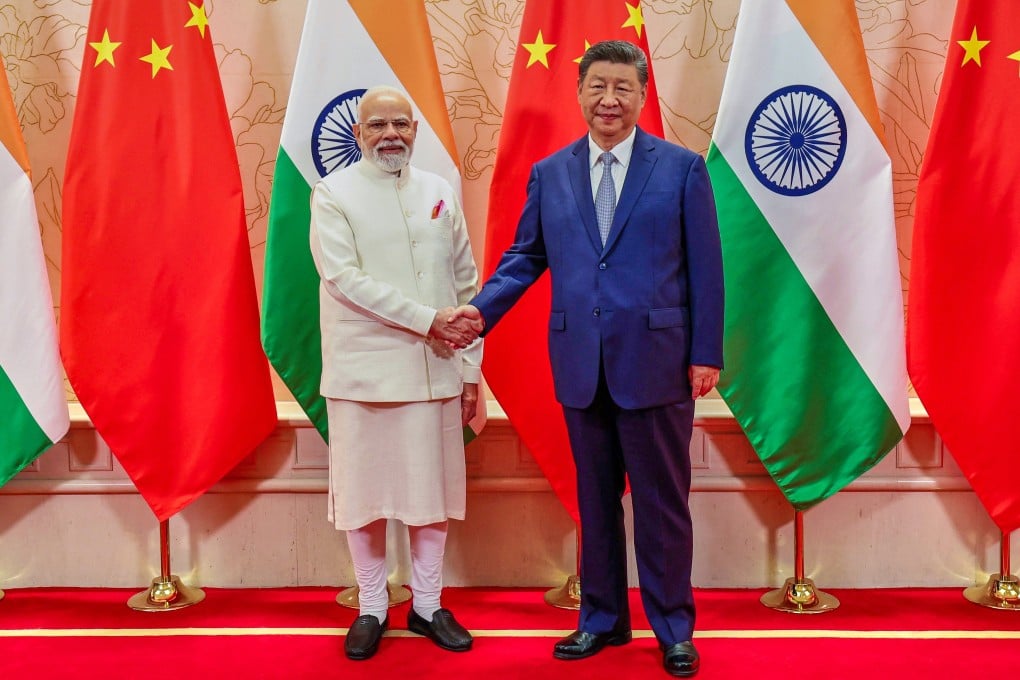 Chinese President Xi Jinping meets Indian Prime Minister Narendra Modi in Tianjin on Sunday. Photo: Handout via AP