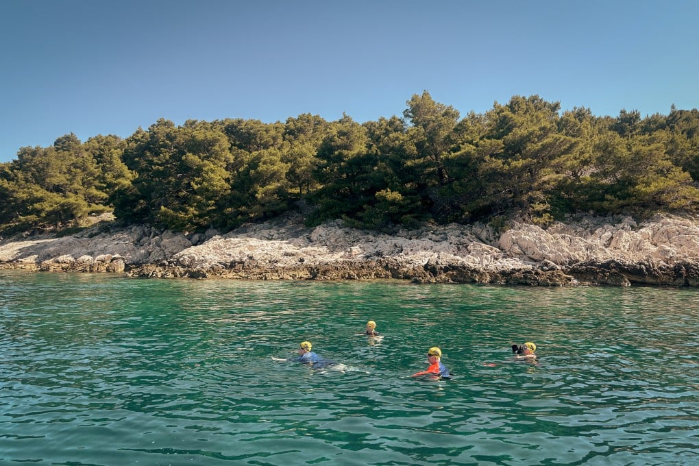 Swimmers from writer Teresa Bergen’s group
in the waters around Prvić, Croatia. Photo: Teresa Bergen