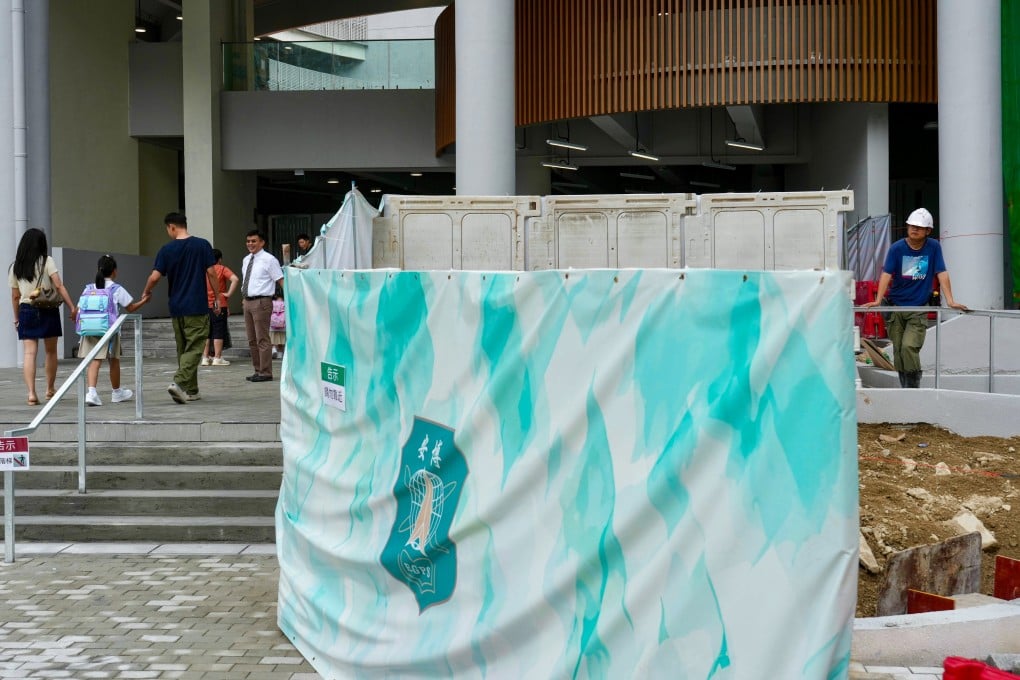 Students head to Erudite Government Primary School for the first day of the new academic year. Photo: Sam Tsang
