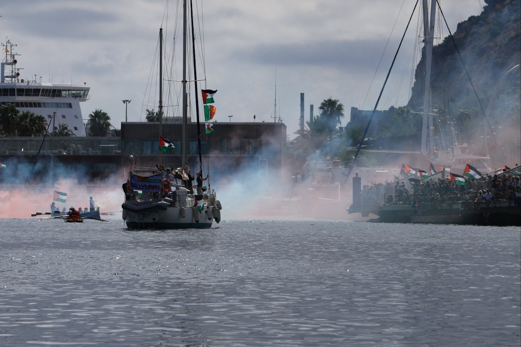 Palestinian flags flutter on boats on the day of the departure of the Global Sumud Flotilla, a humanitarian expedition to Gaza, at the port of Barcelona, Spain on Sunday. Photo: Reuters