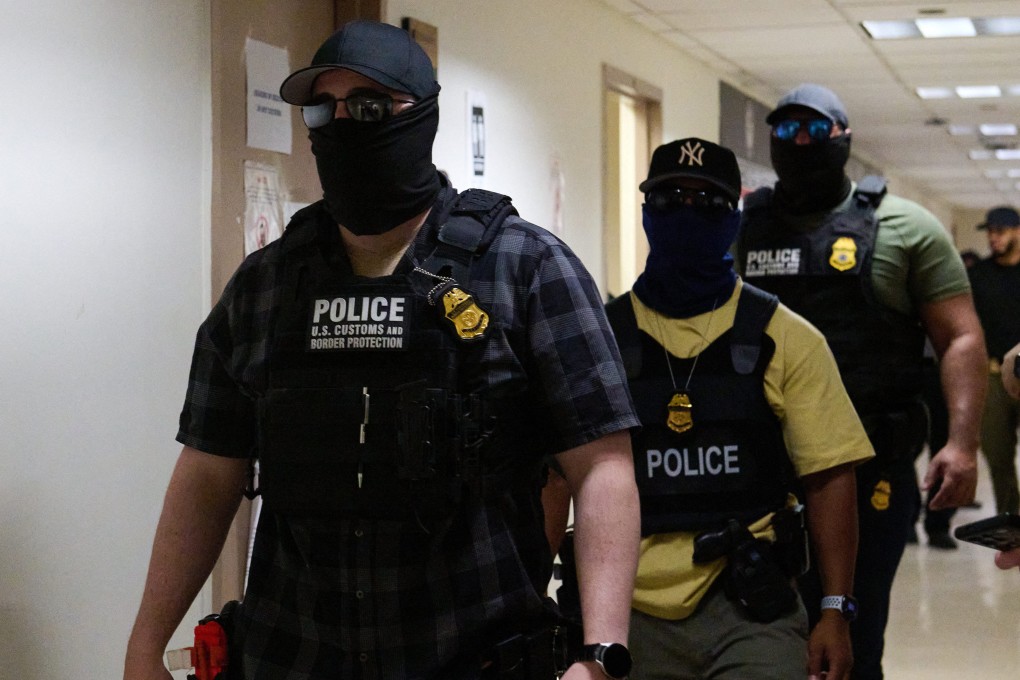 US federal agents working for ICE detain immigrants and asylum seekers reporting for immigration court proceedings in New York City. File photo: AFP