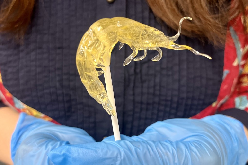 Hongkonger Anne Sit holds a shrimp she sculpted out of sugar in less than two minutes. Photo: Kylie Knott