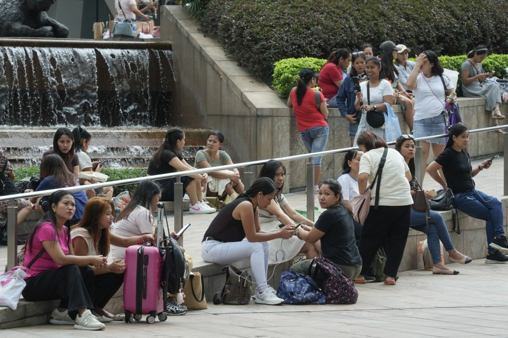 Foreign domestic helpers on their day off in Central. Photo: Sun Yeung