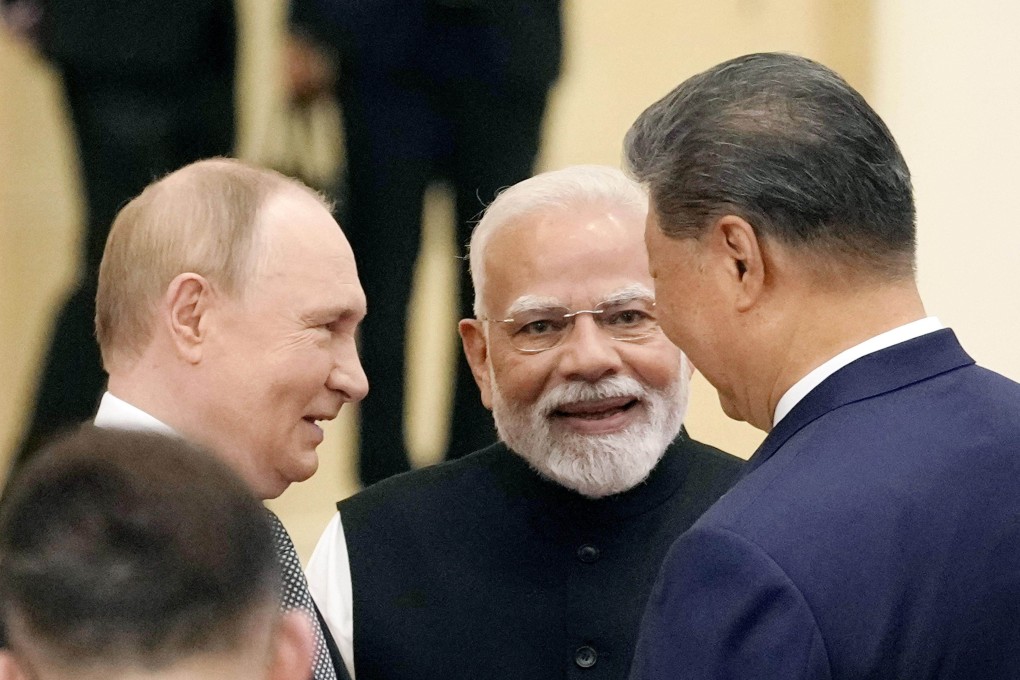 Russia’s Vladimir Putin, India’s Narendra Modi and China’s Xi Jinping. Photo: Kyodo