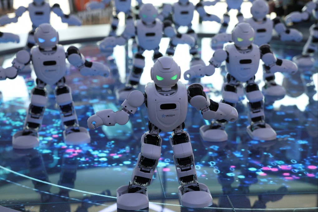 UBTech’s Alpha robots perform a synchronised dance at Beijing’s Robot Mall. Photo: Reuters