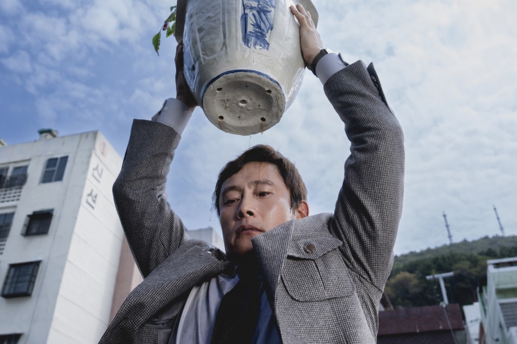 Lee Byung-hun as a desperate jobseeker in a still from No Other Choice, directed by Park Chan-wook. Son Ye-jin and Park Hee-soon co-star.