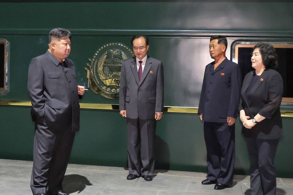 North Korea’s leader Kim Jong-un (left) departs from Pyongyang by special train to visit Beijing on Monday. Photo: KCNA/AFP