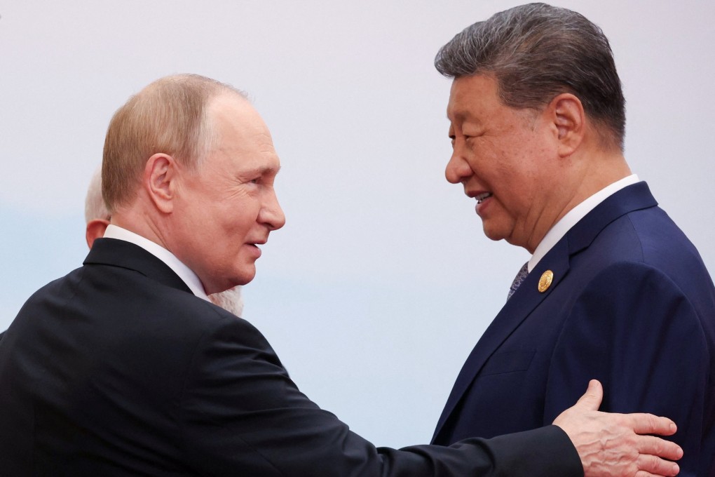 Russian President Vladimir Putin and President Xi Jinping speak at the Shanghai Cooperation Organisation summit in Tianjin, China, on Monday. Photo: Reuters