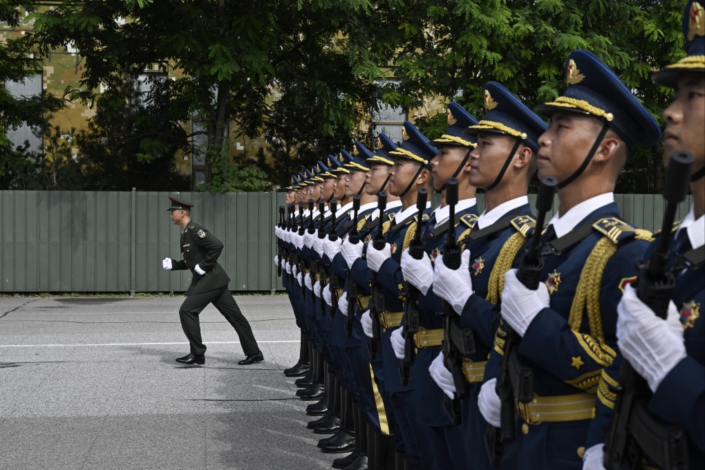 An officer runs back to his position after correcting soldiers from the People’s Liberation Army as they march in formation during a  practice for an upcoming military parade to mark the 80th anniversary of the end of World War II and Japan’s surrender, at a military base on August 20 in Beijing, China. Photo: Getty Images