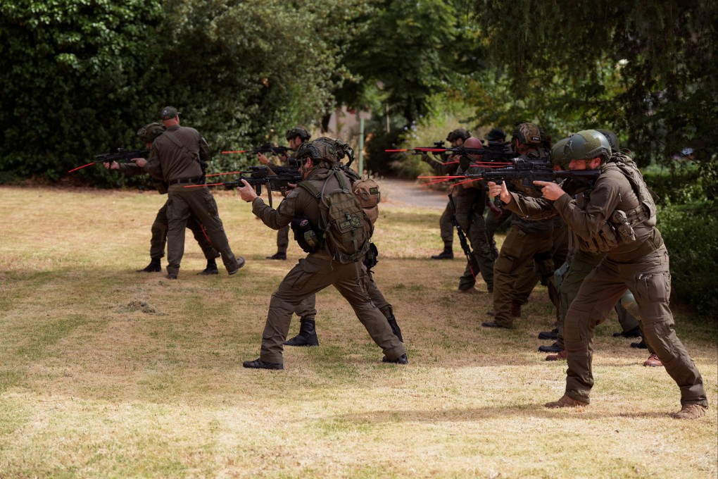 Members of a kibbutz, who were recruited as reservists and act as the immediate responders team of the kibbutz, take part in a military training session in May 2024. Photo: Reuters