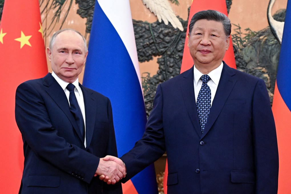Chinese leader Xi Jinping and Russian President Vladimir Putin ahead of their meeting in Beijing on Tuesday. Photo: Pool via Reuters