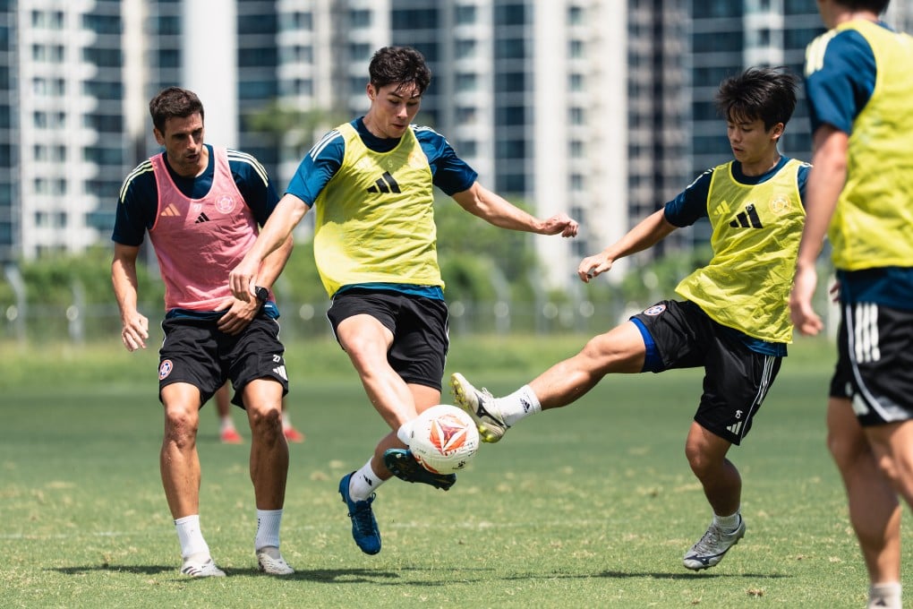 Marco Lorenz (middle) tries to resist a training ground challenge from Lau Kwan-ching. Photo: Eastern FC