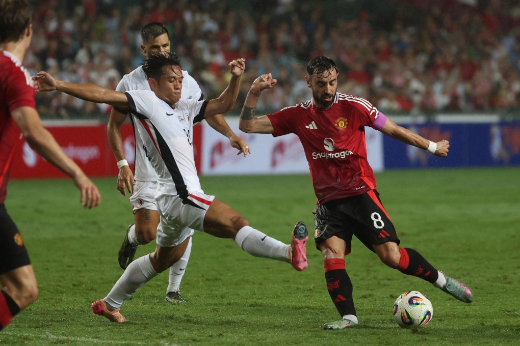 Ngan Cheuk-pan rushes to block Bruno Fernandes’ shot in Hong Kong’s friendly against Manchester United in May. Photo: Reuters