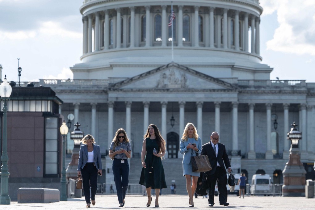 Theresa Helm (centre), an abuse victim of Jeffery Epstein, walks with a group of women after they spoke behind closed doors with the House Oversight Committee at the US Capitol in Washington on Tuesday. Photo: AFP