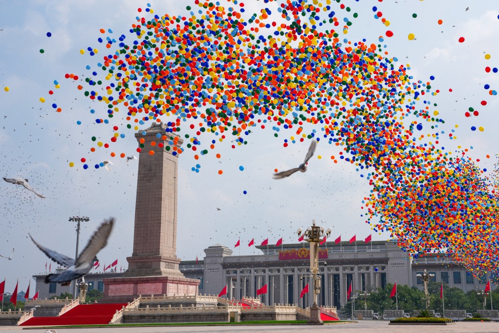 Pigeons and balloons are released into the sky over Tiananmen Square in Beijing on Wednesday, as part of the 80th anniversary commemorations. Photo: Xinhua