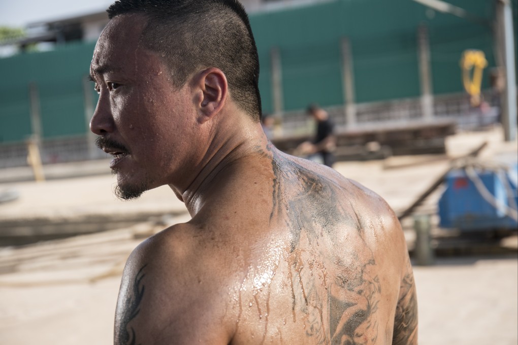 Ronald Cheng plays a father taking on Thai criminals who have taken his daughter in a still from Atonement (category: IIB, Cantonese), directed by Cheng and Mark Wu. Chrissie Chau co-stars.