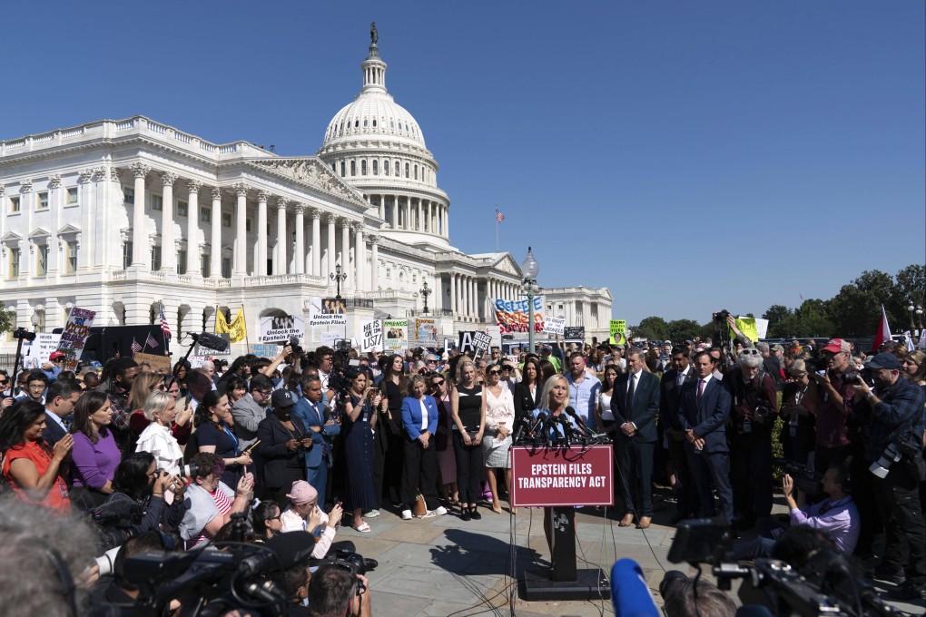 Lawmaker Marjorie Taylor Greene, along with victims of Jeffrey Epstein and Ghislaine Maxwell’s abuse, at the US Capitol in Washington. Photo: AP